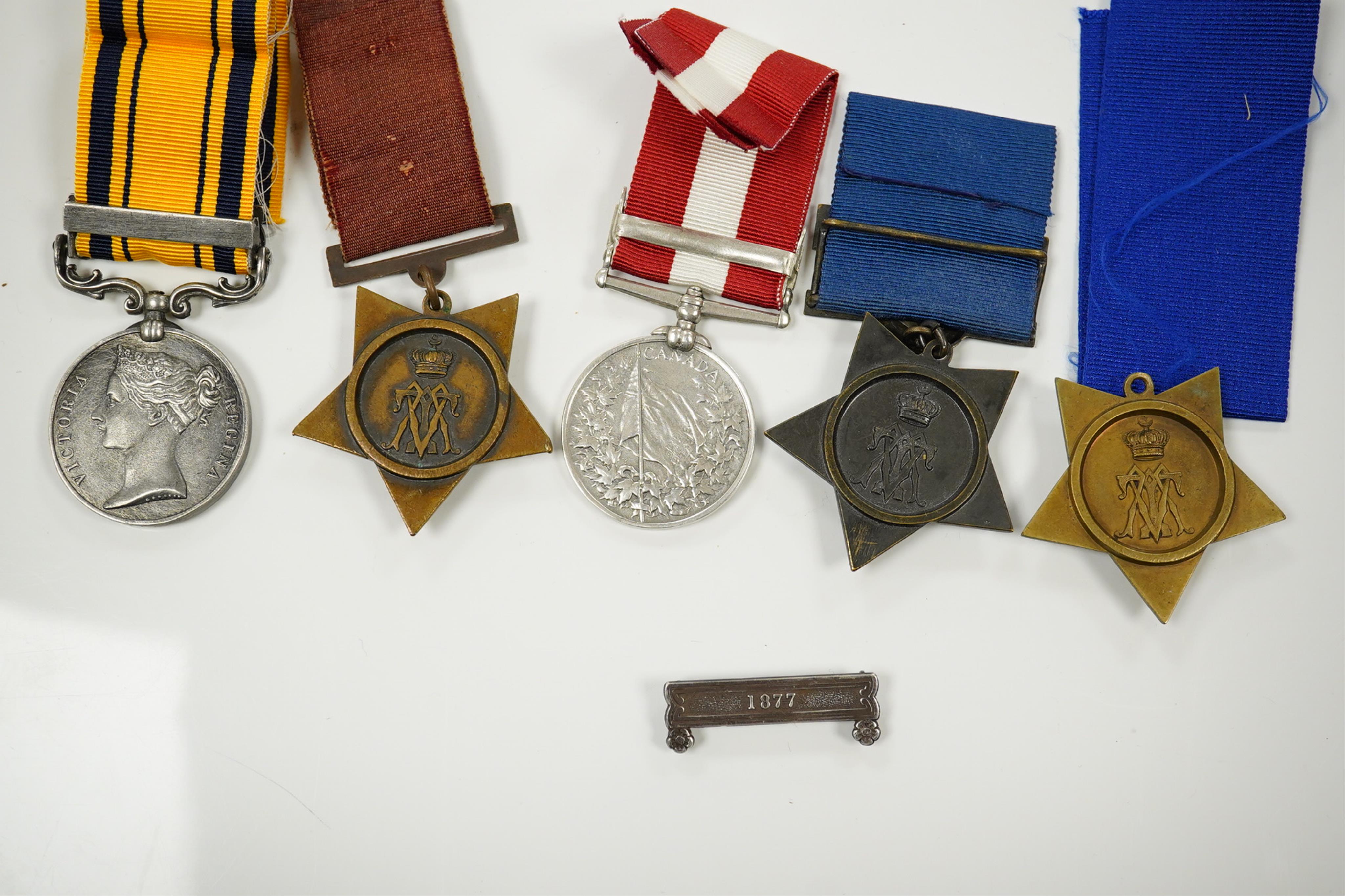 Five replica medals; Khedive's Star 1882, another undated with clasp and a third, 1884 lacking bar, Canada General Service with Fentan Raid 1866 clasp and South Africa medal with 1877-8-9 clasp and a spare 1877 clasp.